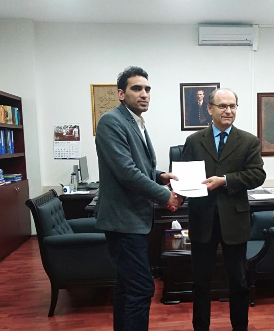 Submission of donation to Prof. Dr. Rahmi ER